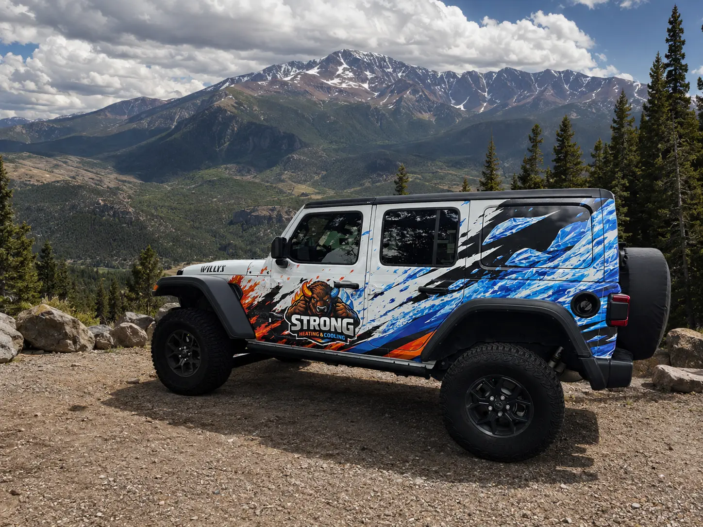 Strong Heating & Cooling wrapped Jeep parked with Pikes Peak in the background