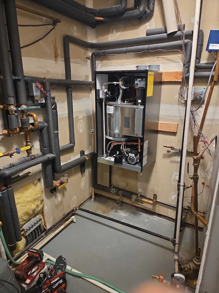 Boiler install with neat, labeled piping