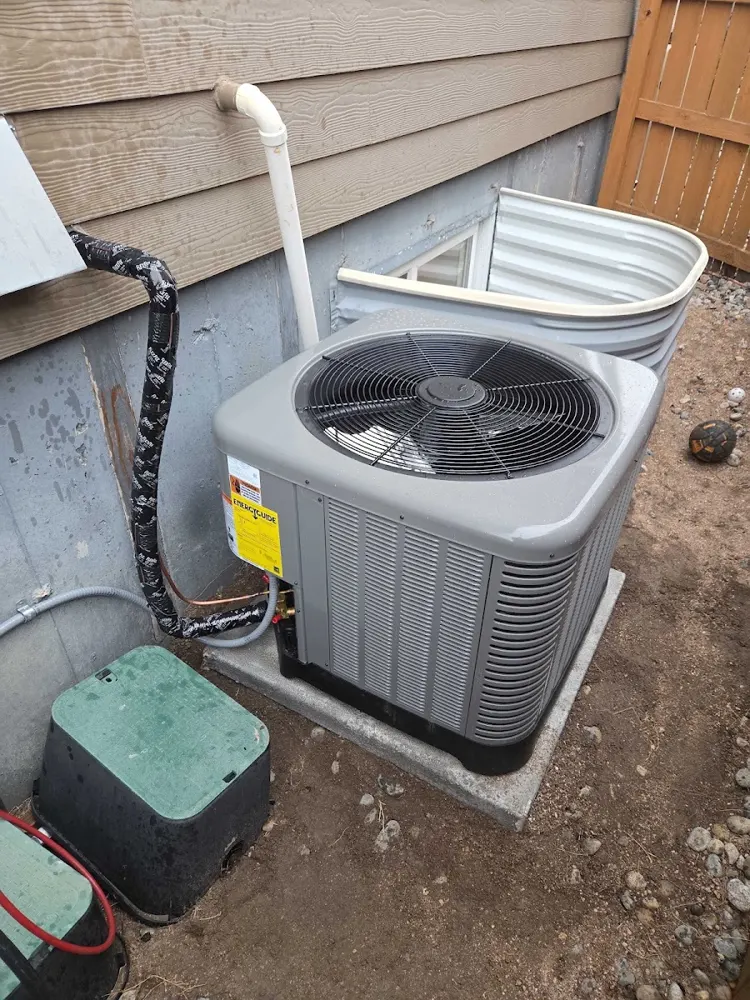 AC condenser next to a window well