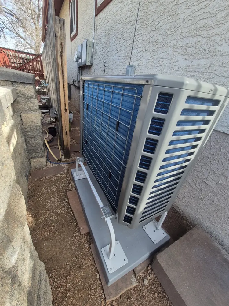 Heat pump outdoor unit in a narrow side yard