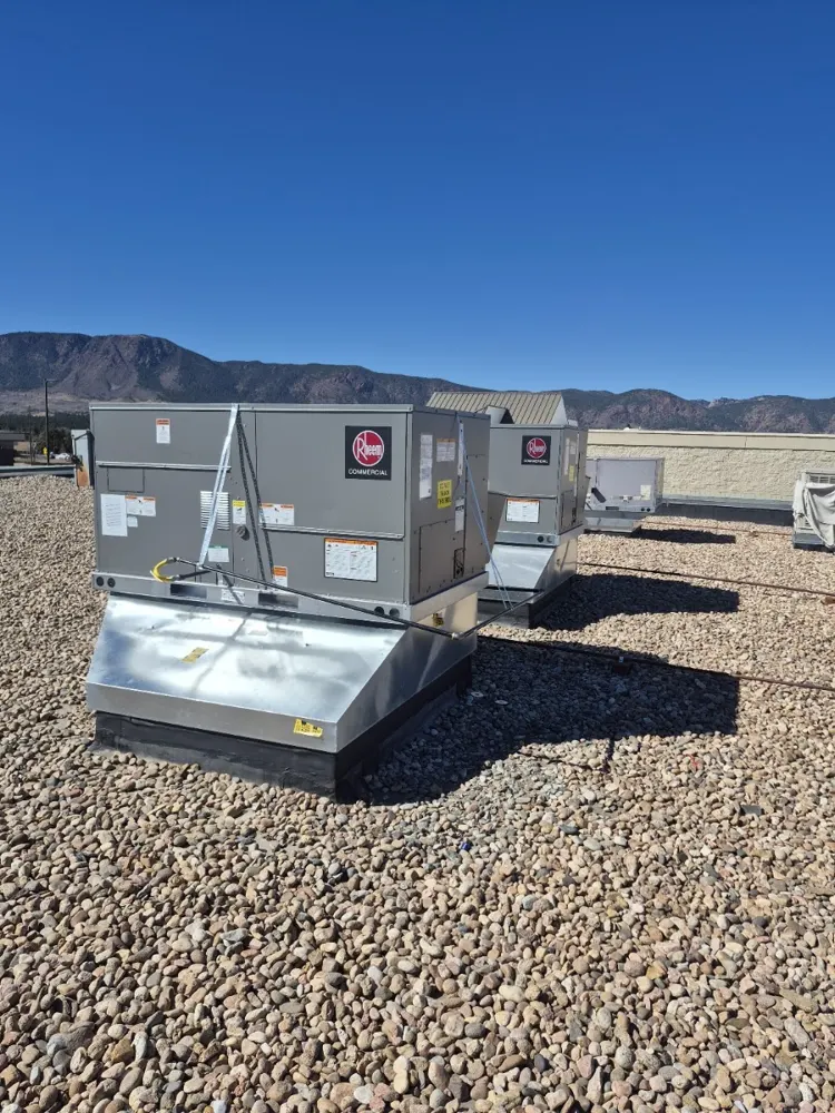 Commercial rooftop units with a Pikes Peak view