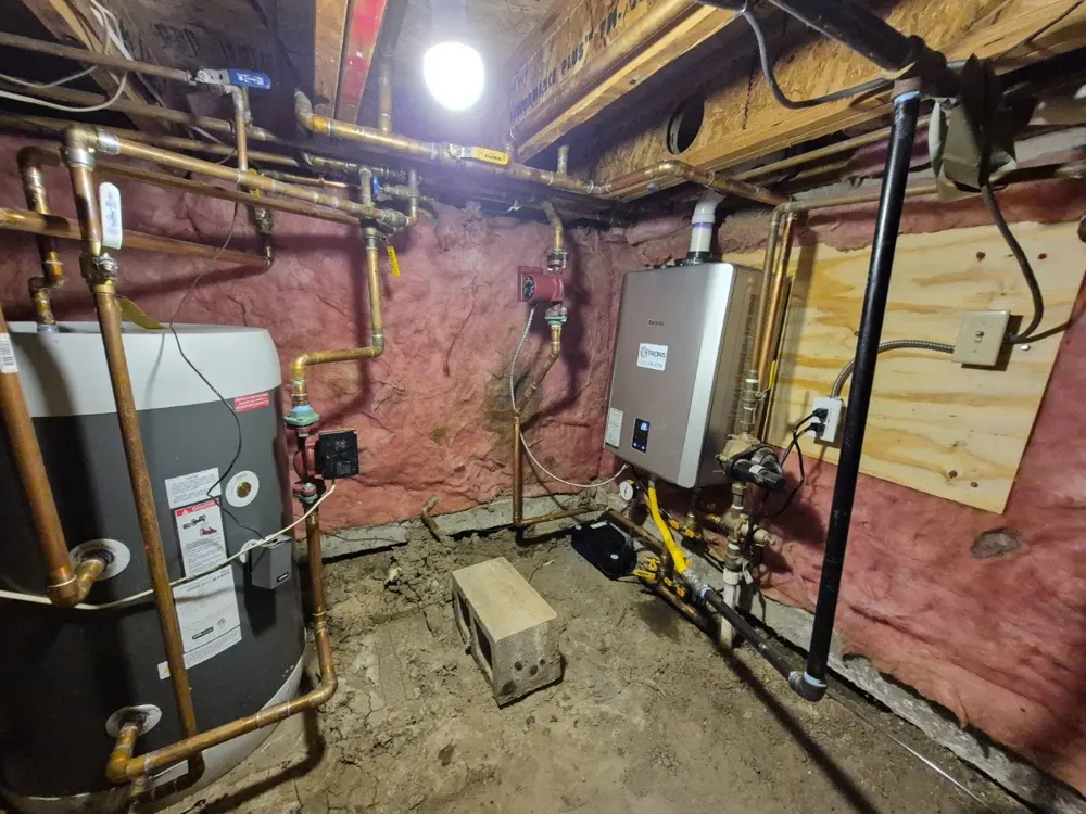 Boiler and indirect tank in a crawlspace-level basement