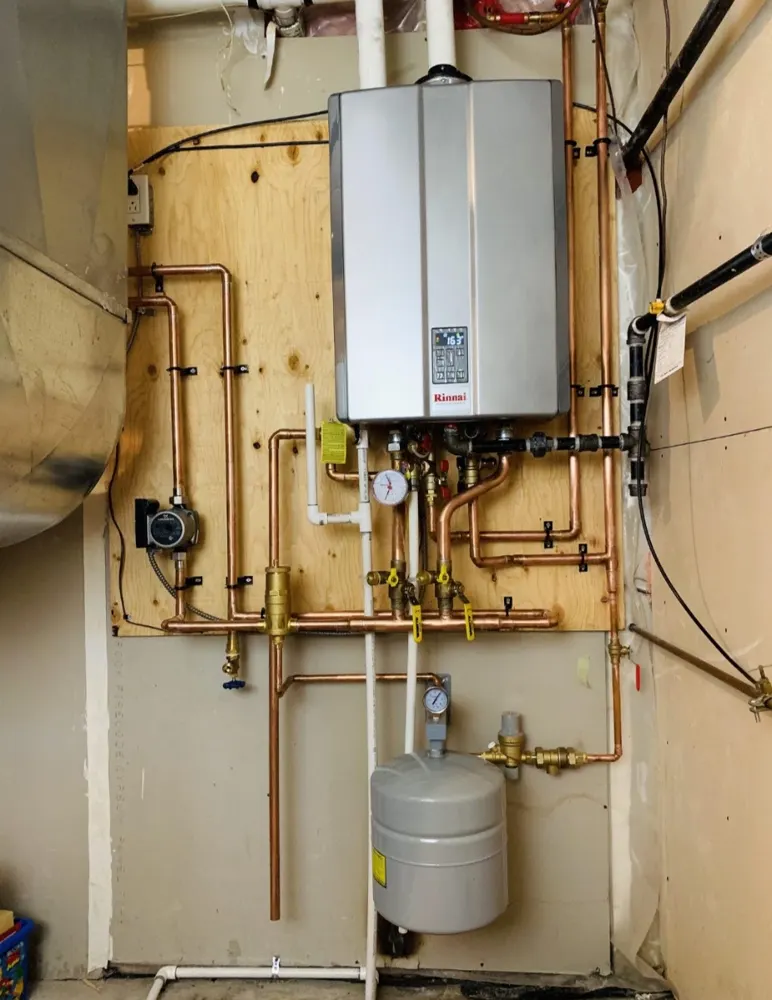 Tankless water heater with new gas and water piping